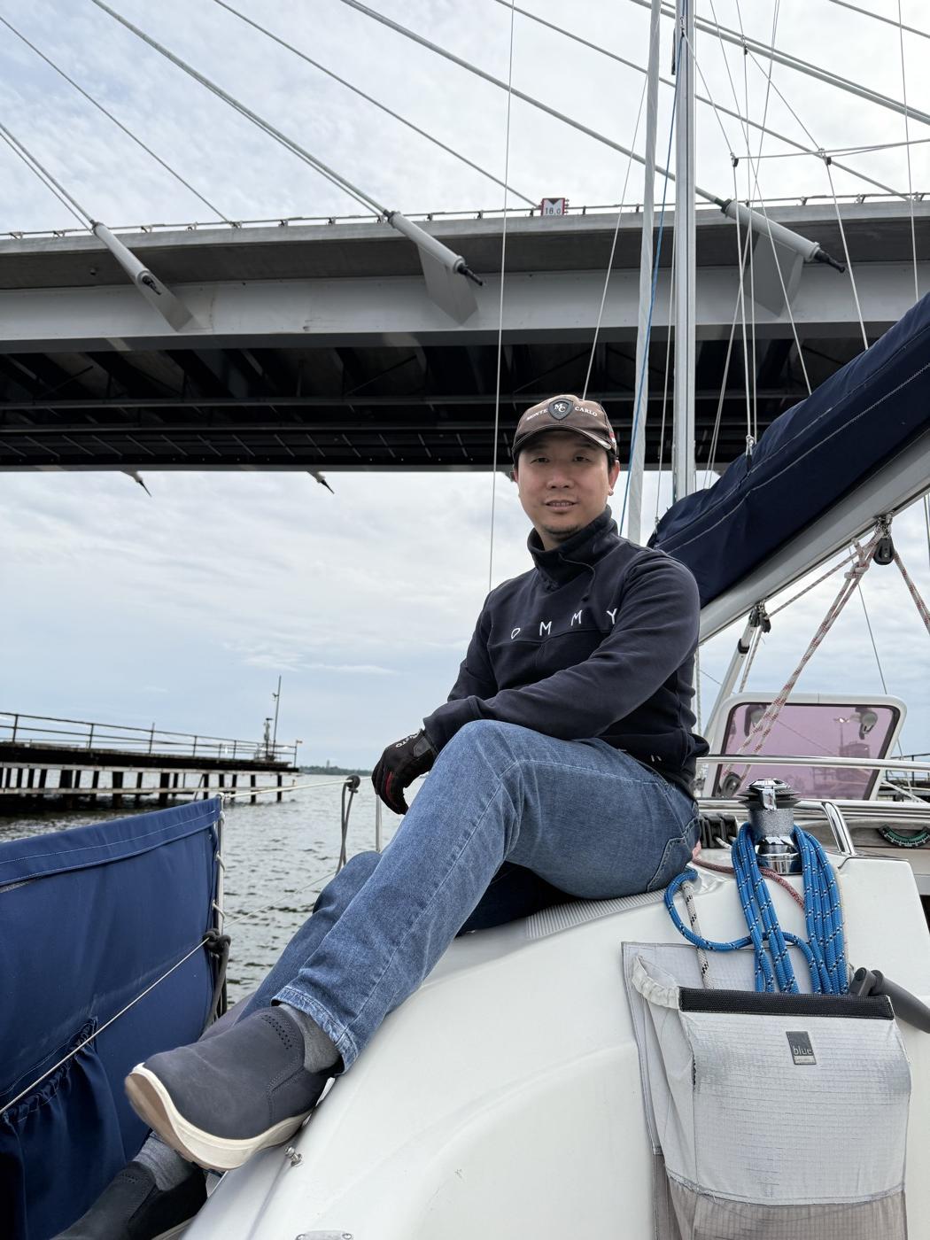 Yang Yu aboard his boat in Helsinki