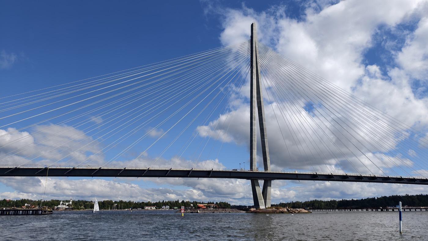 A cable-stayed bridge seen from the water near Helsinki